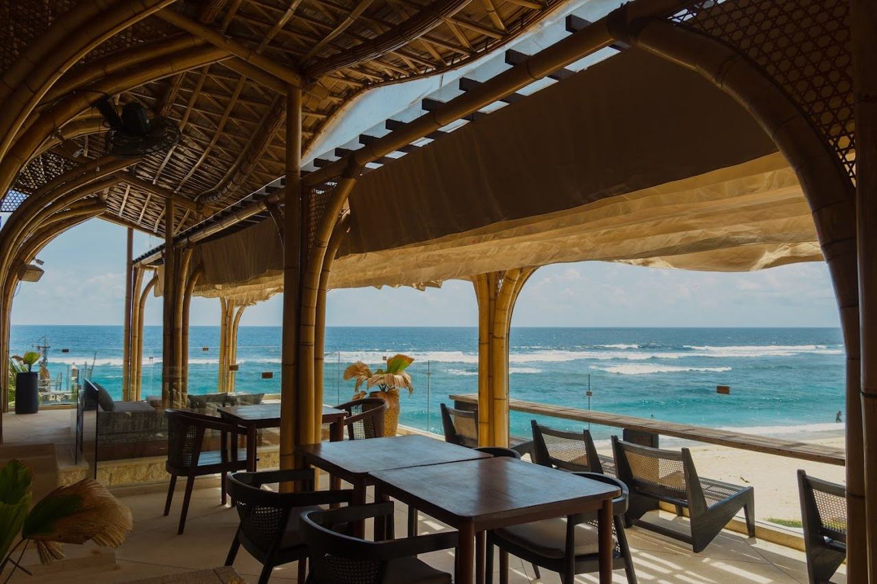 Oceanfront cabanas and pool at Tropical Temptation Beach Club on Melasti Beach