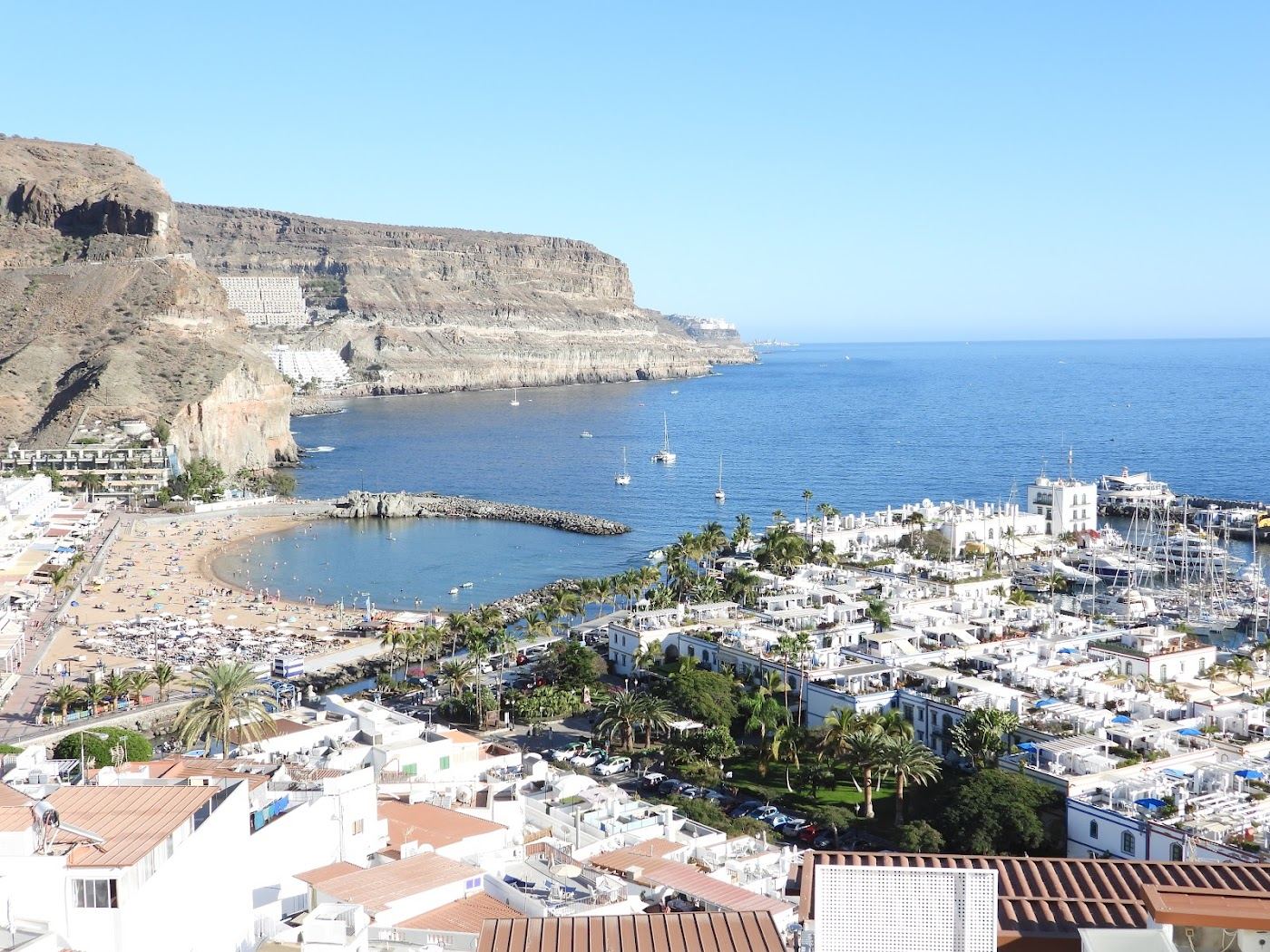Marina, canals and small golden beach at Puerto de Mogan in south west Gran Canaria