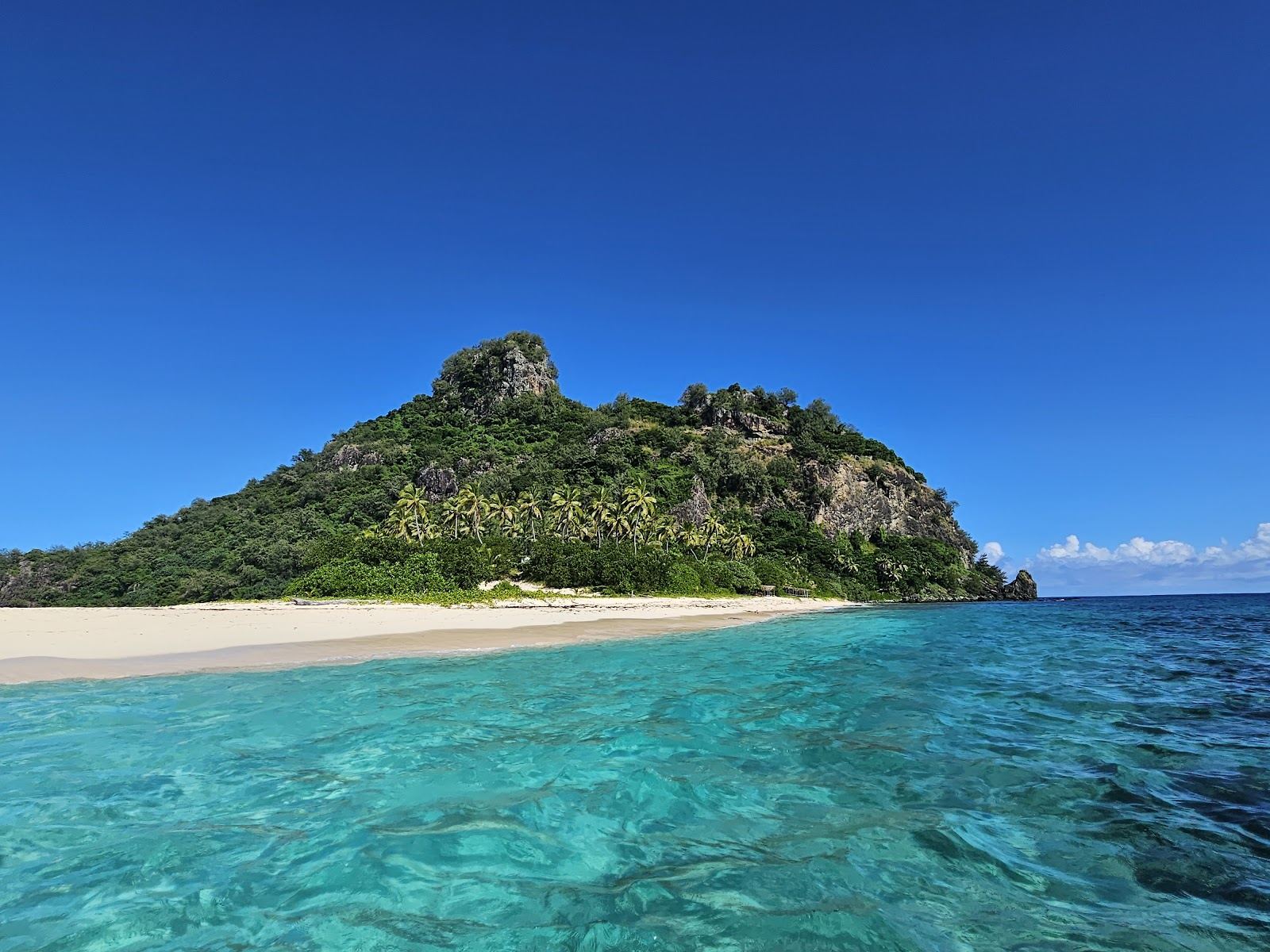 Deserted white sand and clear water at Monuriki island in the Mamanucas of Fiji