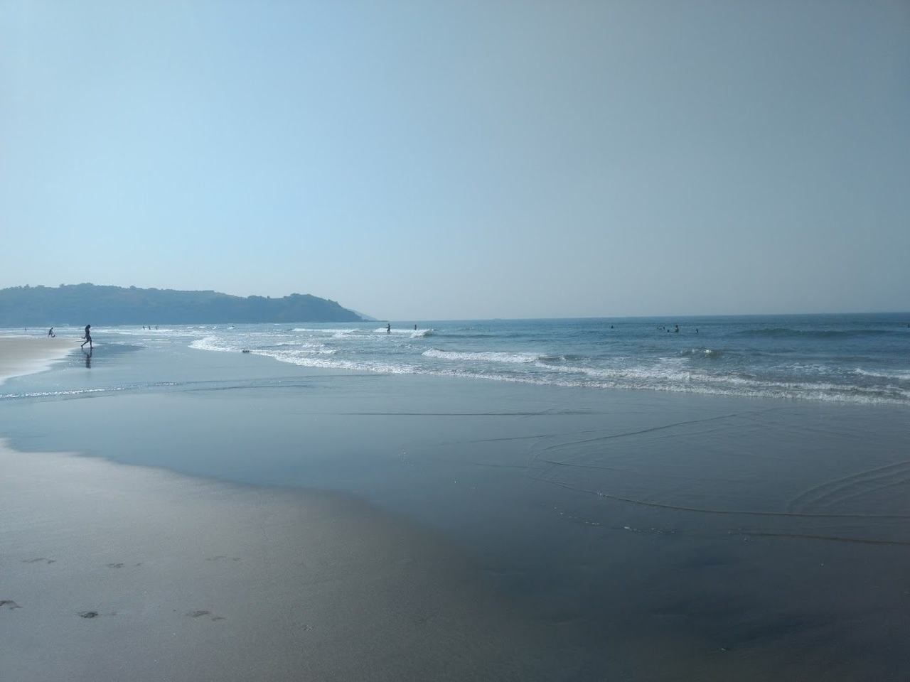 Morjim Beach wide quiet turtle nesting sand by the Chapora river mouth in North Goa