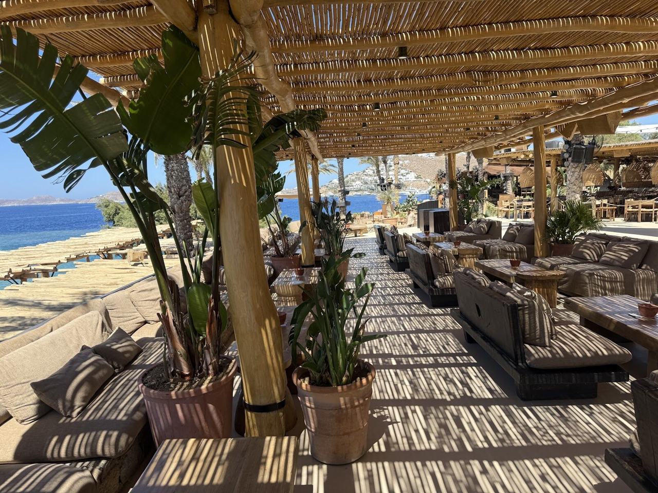 Beach club daybeds on the Mykonos coast