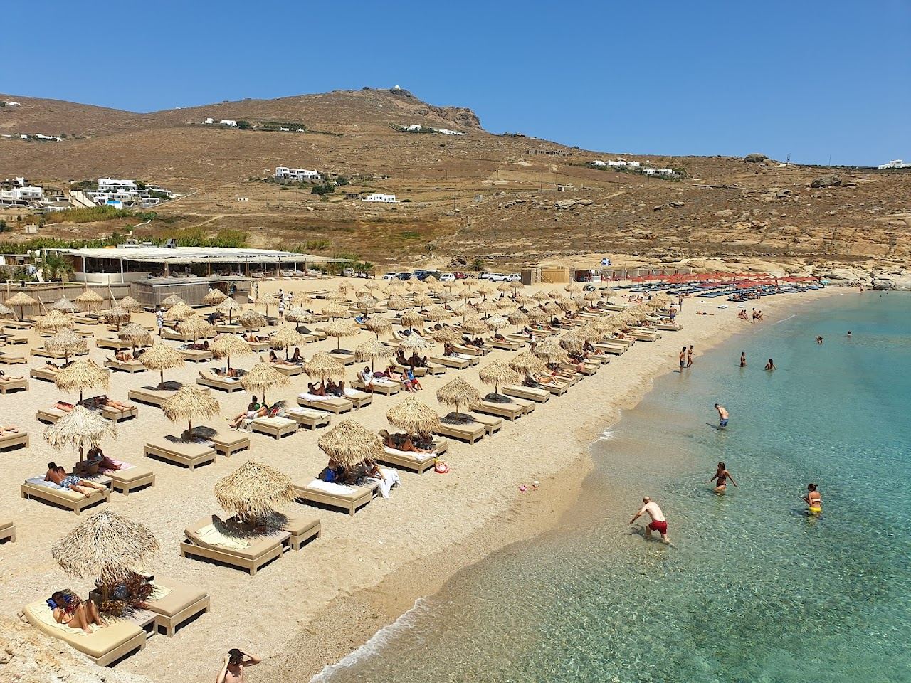 Clear blue water over rocks at Lia beach on the quiet southeast coast of Mykonos
