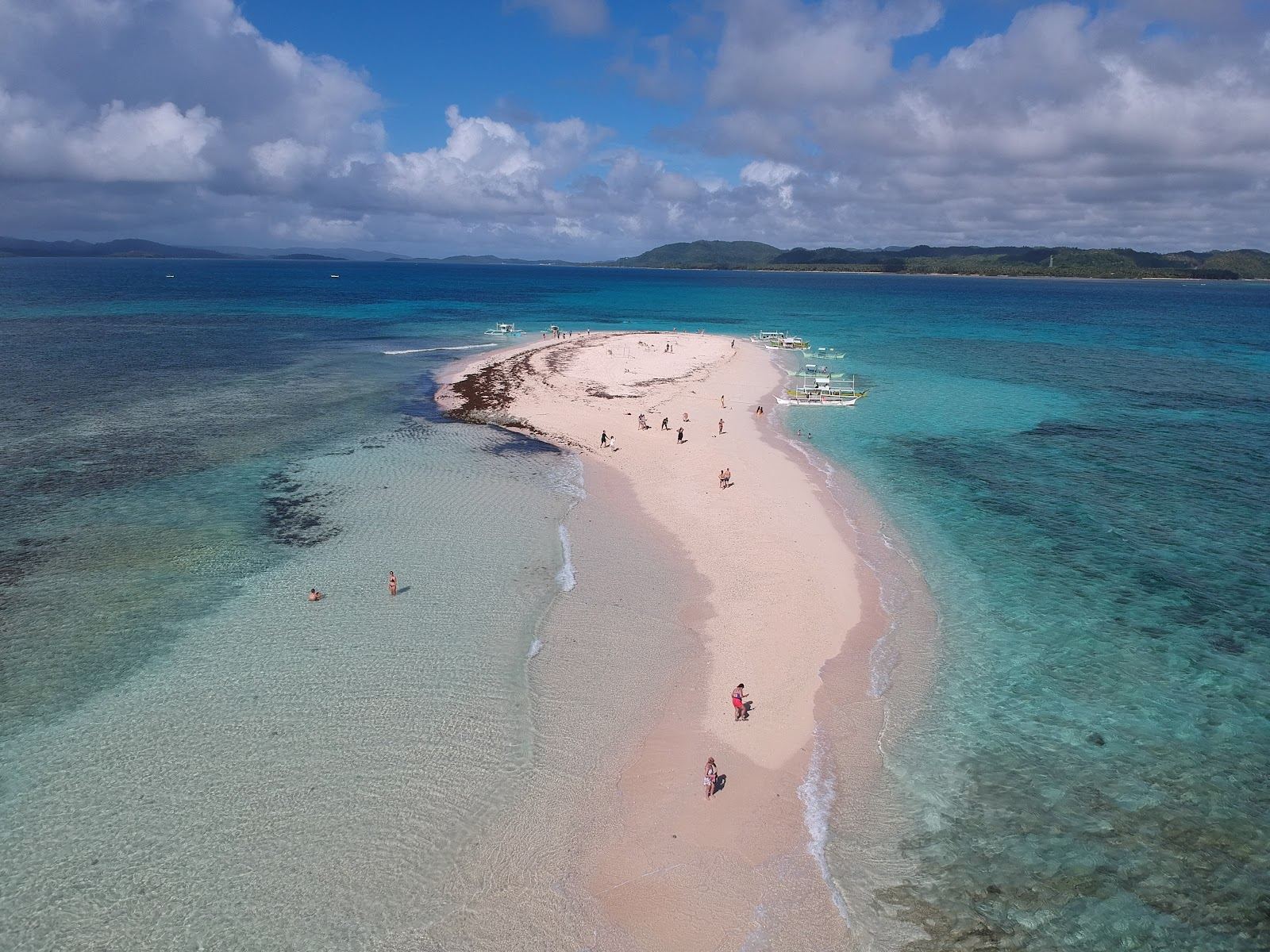 Naked Island bare white sand bar with clear shallow water off Siargao