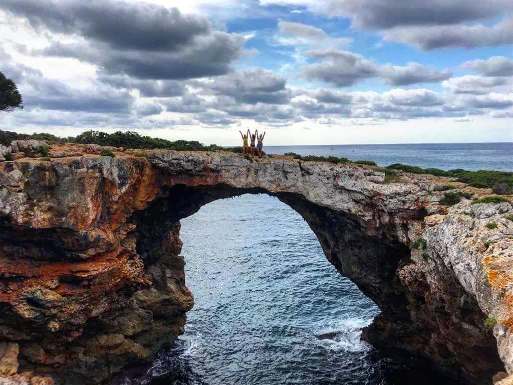 A hidden cove of pale sand and clear water reached by a footpath on the east of Mallorca