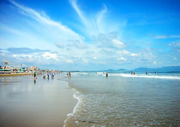 The long open sweep of Bai Dai beach near Nha Trang in Vietnam, a watersports beach with room for surf and wind