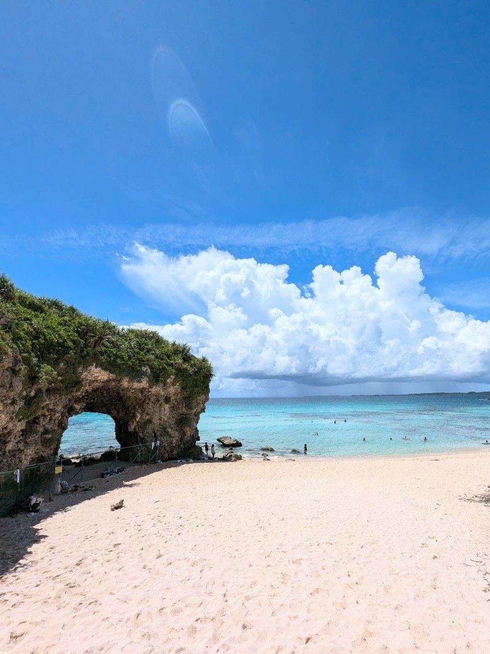 Quiet Okinawa cove at golden hour with soft light over calm water