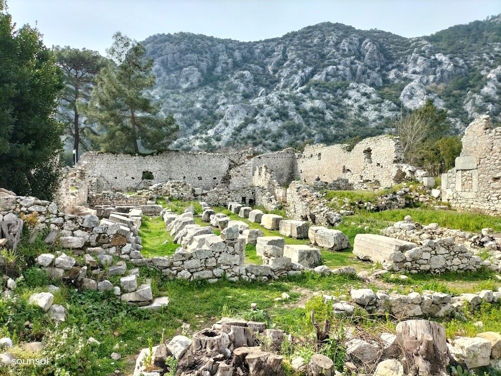 The path through the ancient ruins of Olympos leading down to the gentle pebble beach near Antalya