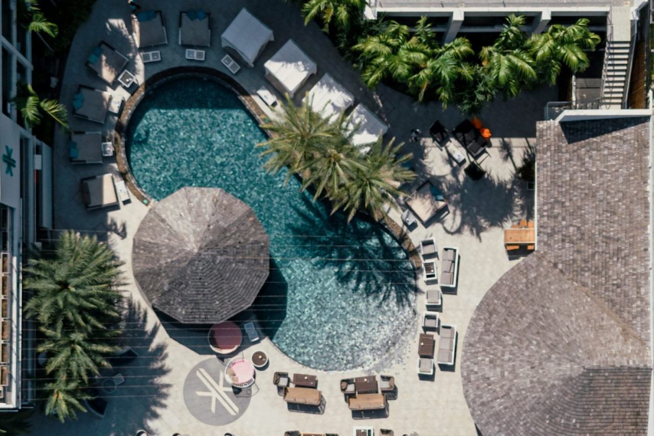 Beachfront pool and terrace at Kudo Beach Club on Patong Beach