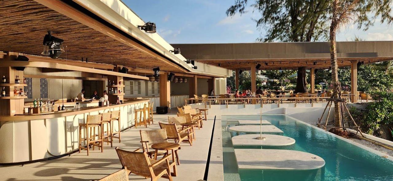 Elegant loungers and pool at Fuga Beach Club at the northern end of Patong Beach
