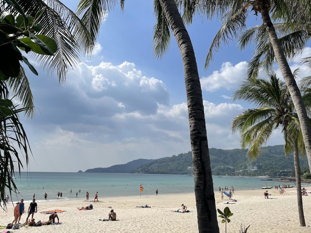 The curved bay and shoreline of Patong Beach on the west coast of Phuket