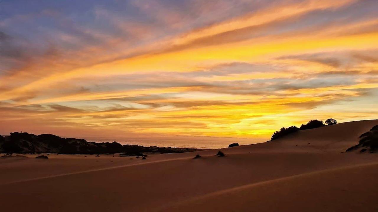 Piscinas golden desert dunes meeting the sea on the Costa Verde Sardinia