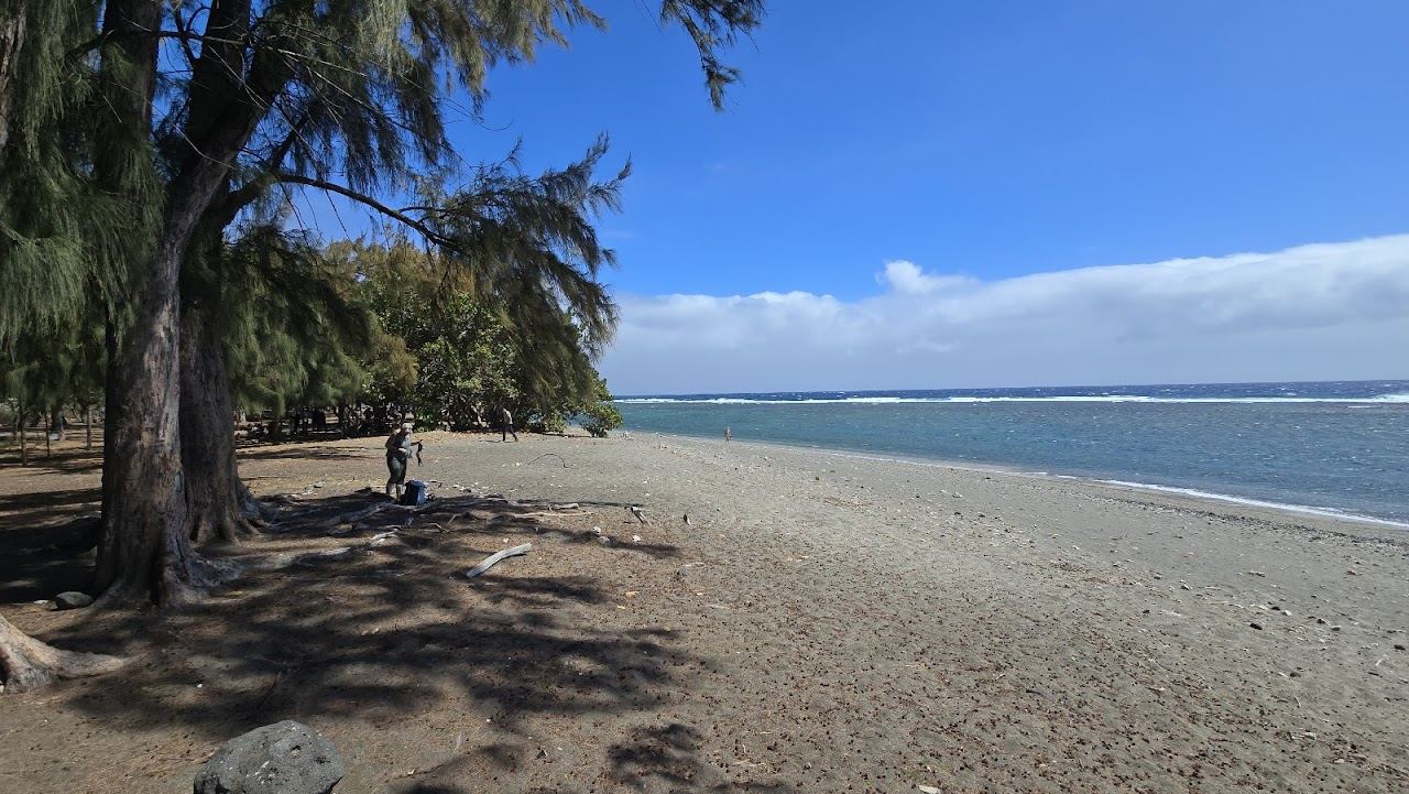 The relaxed seafront and reef lagoon at Plage de Saint Leu on the west coast of Reunion