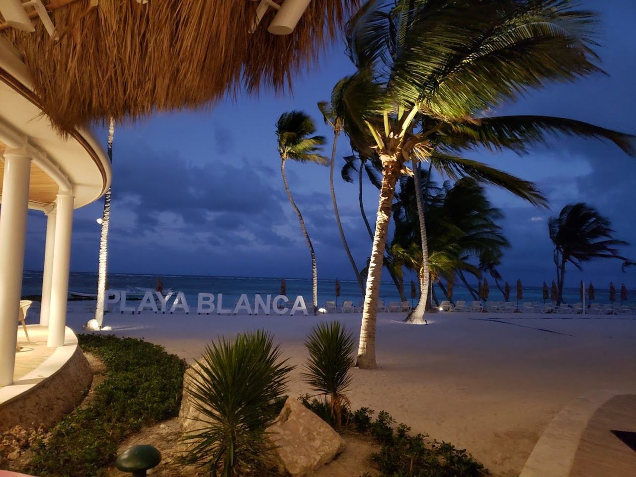 Calm turquoise shallows and pale sand at Playa Blanca in Cap Cana