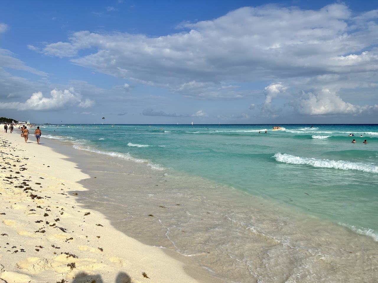 Wide quiet white sand and calm turquoise water at Playacar Beach south of Playa del Carmen