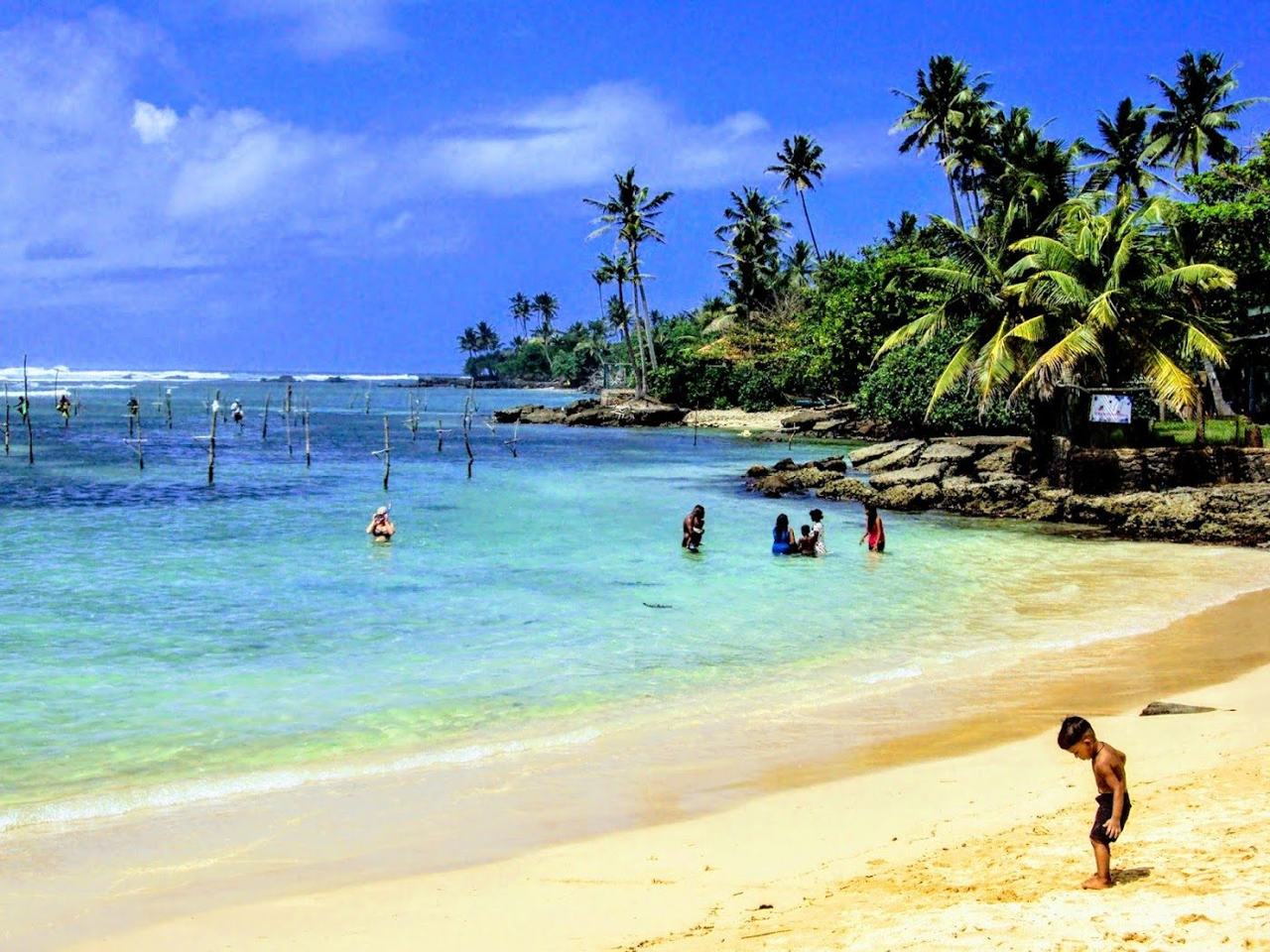 Polhena Beach shallow reef protected lagoon with calm clear water near Matara