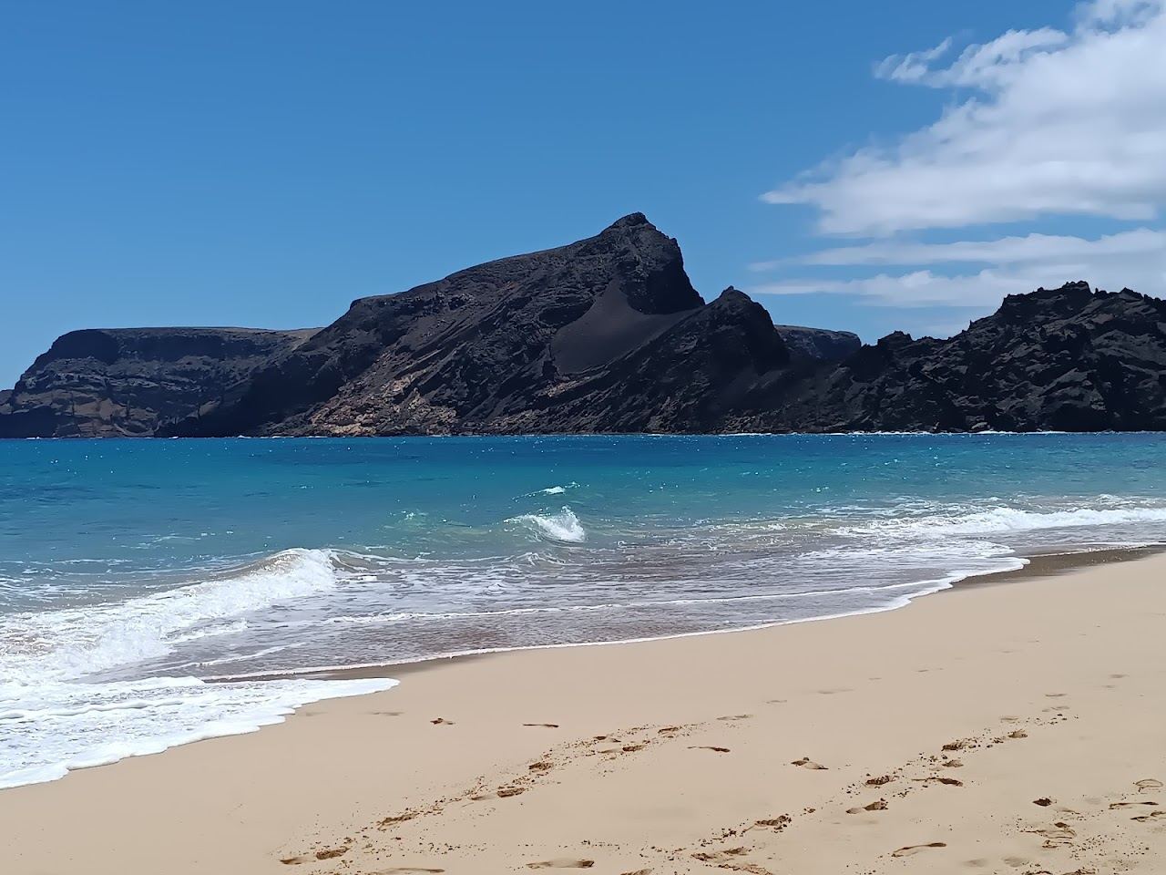 Long sweep of natural golden sand and turquoise water on the island of Porto Santo near Madeira