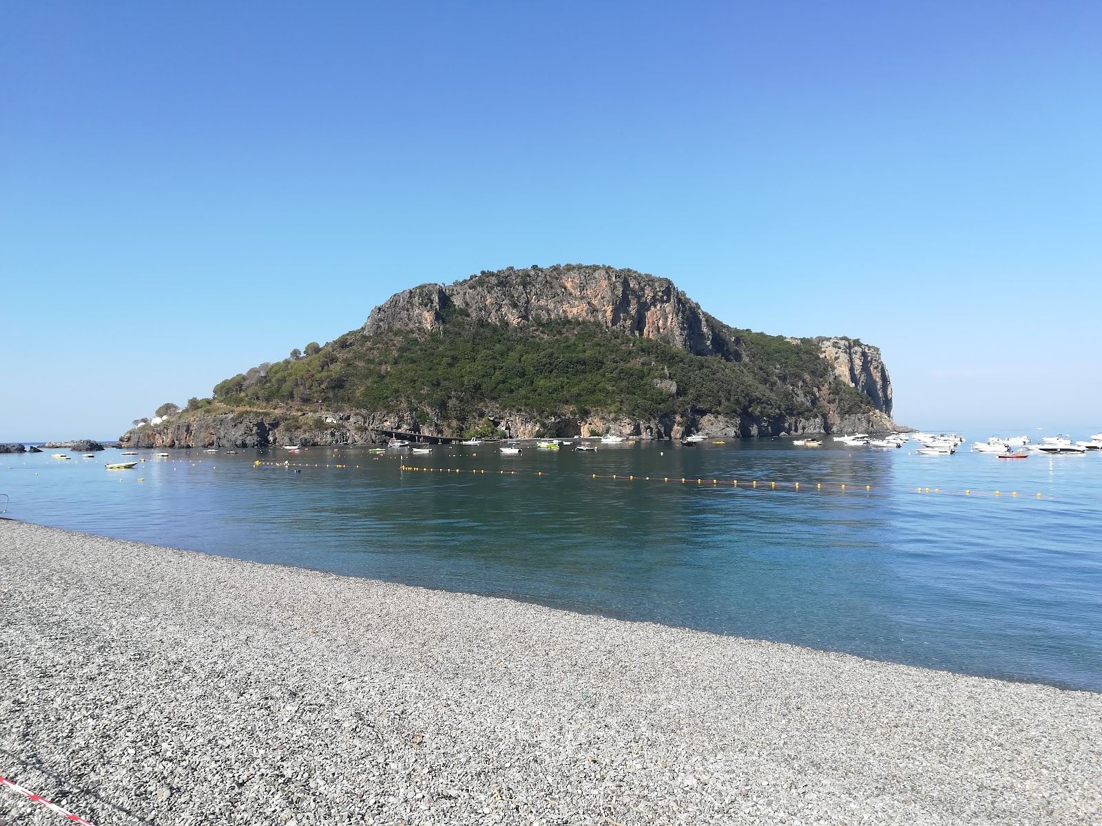 Dark sand and Isola di Dino at Praia a Mare in northern Calabria