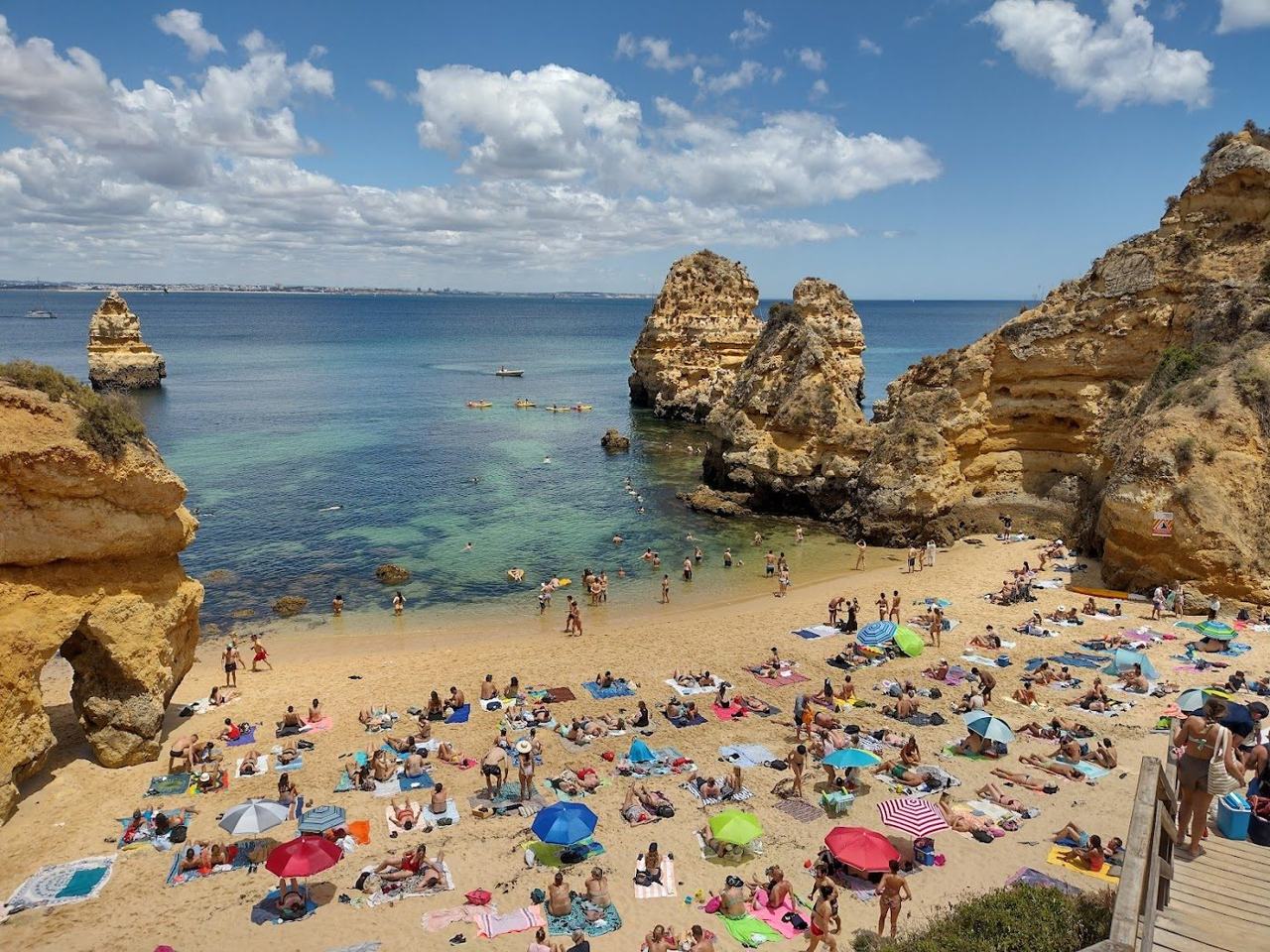 Praia do Camilo wooden stairway and coves near Lagos in the Algarve