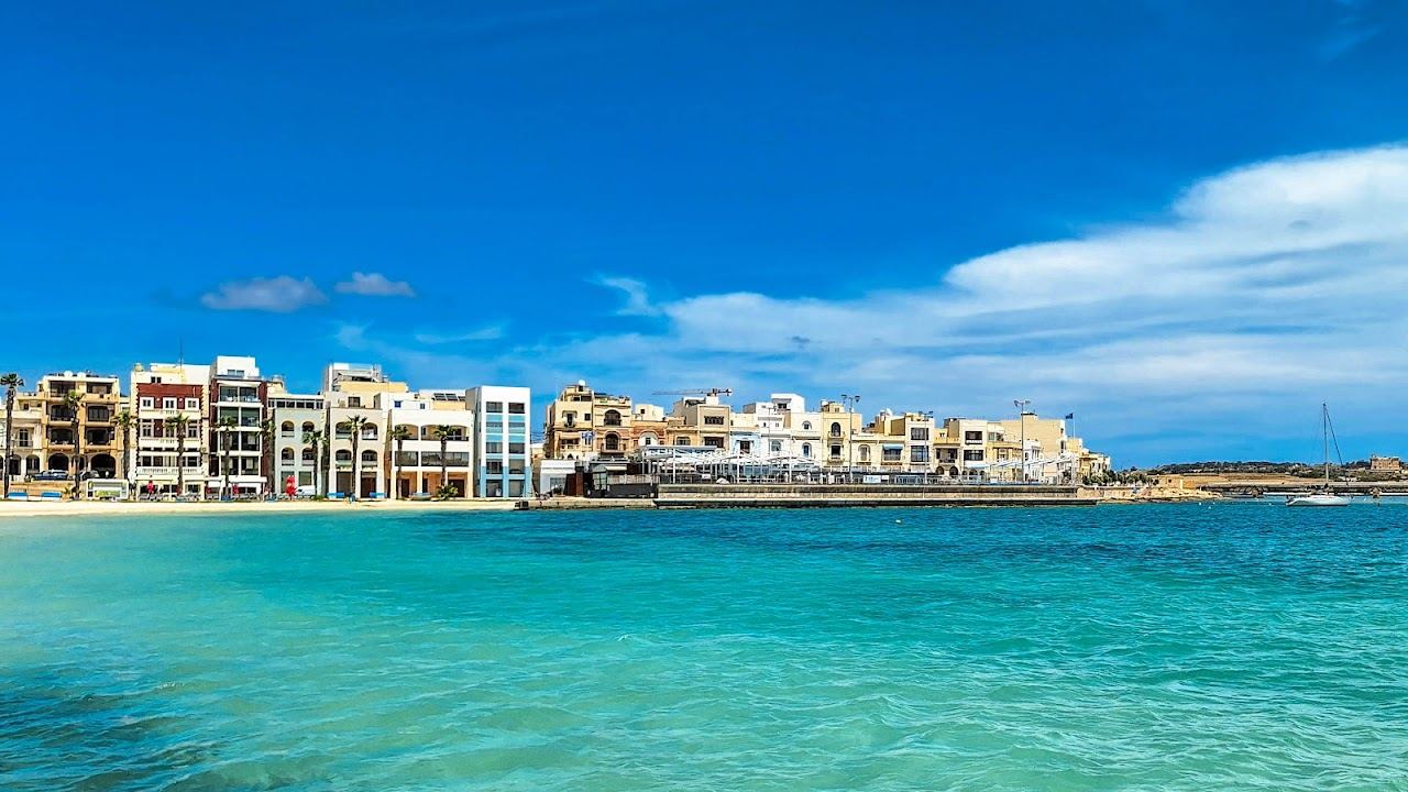 The sheltered sandy beach of Pretty Bay in Birzebbuga in southeast Malta