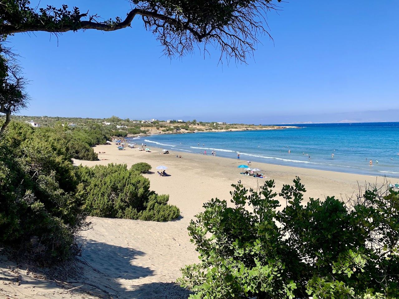 The fine soft sand and shallow clear water of remote Psili Ammos beach on the east coast of Naxos