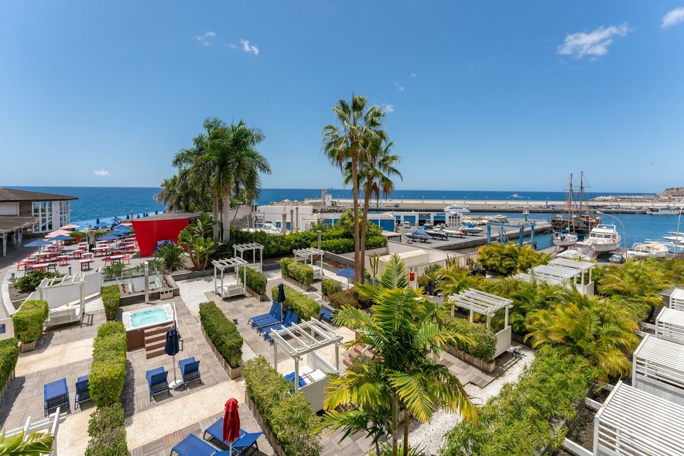 Sheltered golden beach beside the marina at Puerto Rico in south west Gran Canaria