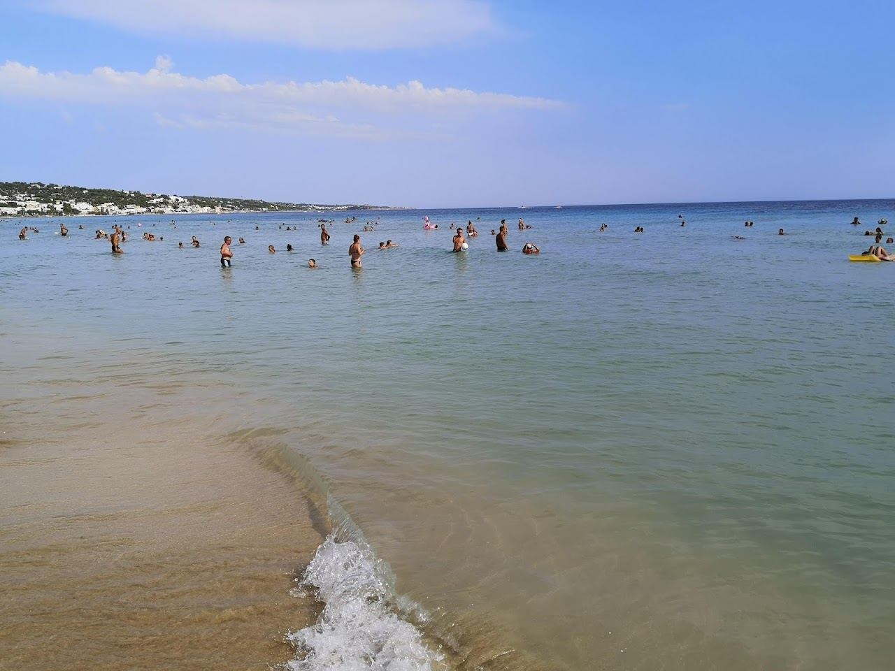 Soft white sand and shallow turquoise water at Marina di Pescoluse, the Maldive del Salento, in Puglia