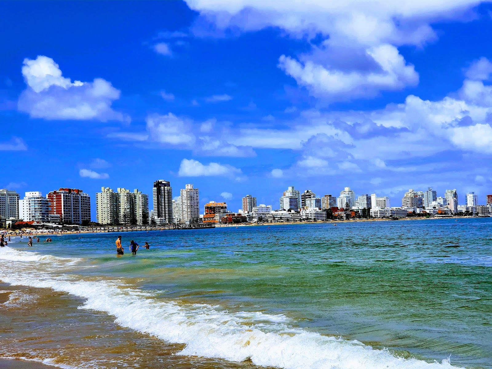 Calm gentle water and broad free sand on the Playa Mansa side of Punta del Este