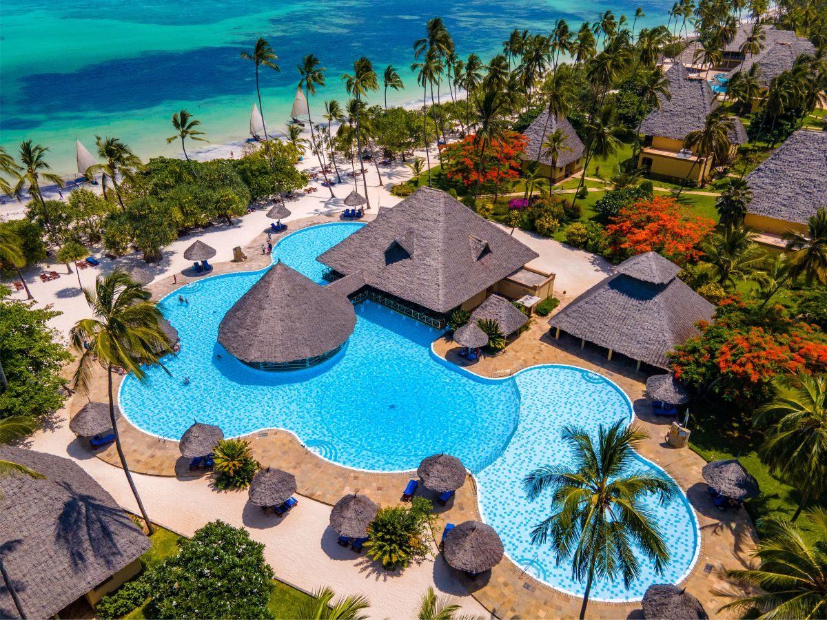 A second view of the wide white sand and shallow reef lagoon at Pwani Mchangani beach on Zanzibar