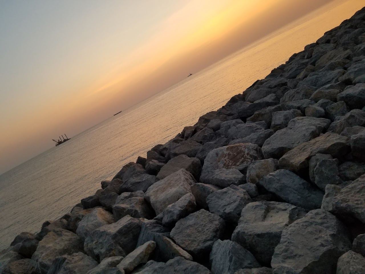 Soft sand and a calm golden Gulf sunset on Al Marjan Island in Ras Al Khaimah