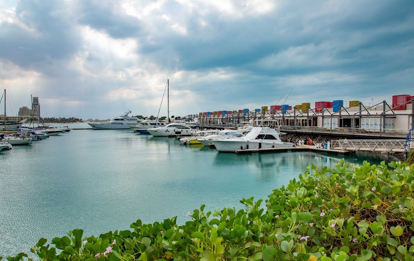 Calm clear water and white sand on the Al Hamra waterfront in Ras Al Khaimah