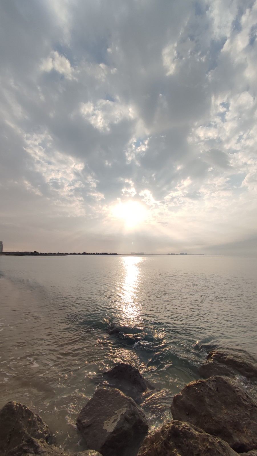 Calm shallow Gulf water and soft sand on a family beach in Ras Al Khaimah