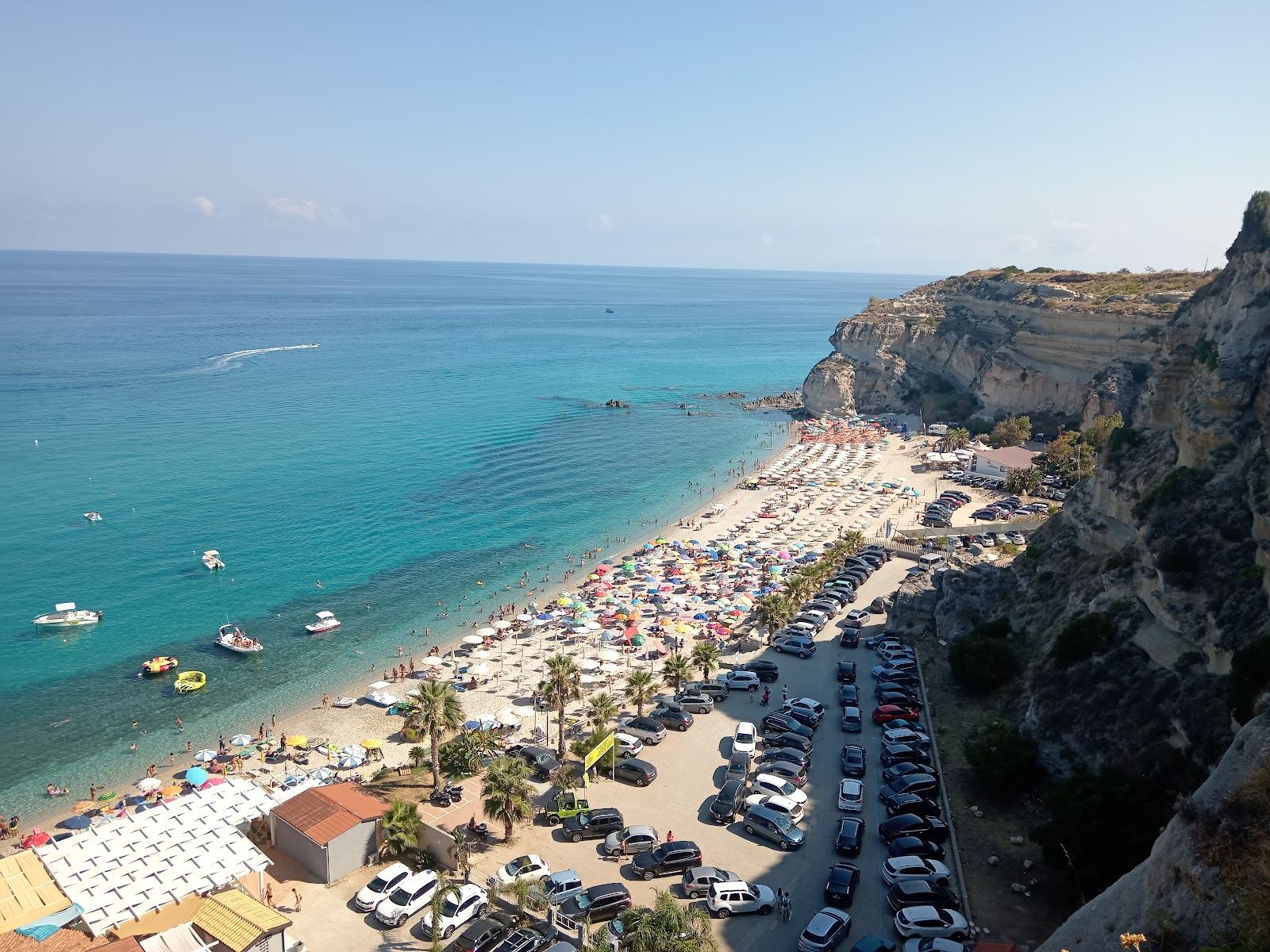 Sandstone stacks and turquoise water at Riaci beach in Calabria