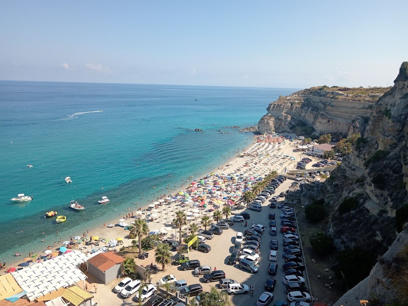 Caves and pale sand along Riaci beach on the Coast of the Gods in Calabria