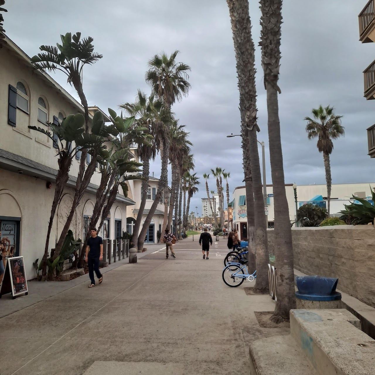 The boardwalk and surf at Pacific Beach in San Diego, California