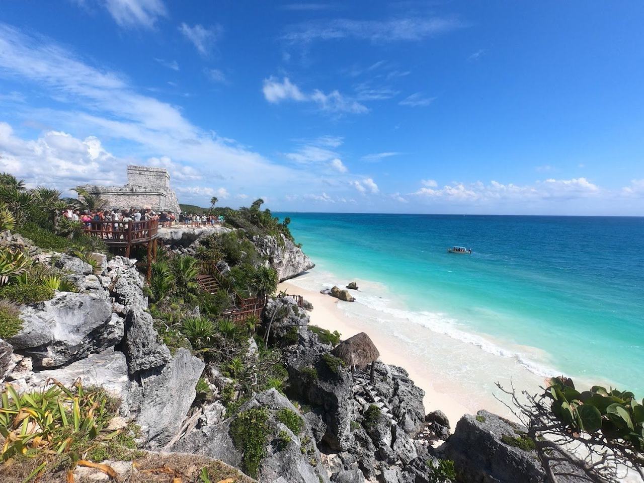 Rustic open sand and palms at Playa Santa Fe near the Tulum ruins