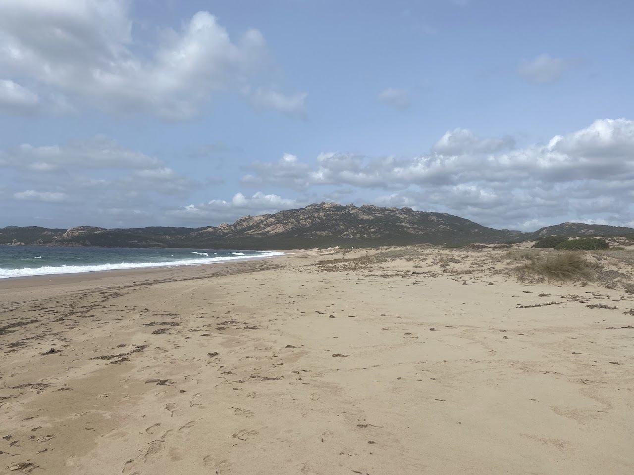 The wild dune backed sweep of Erbaju beach below Roccapina in Corsica