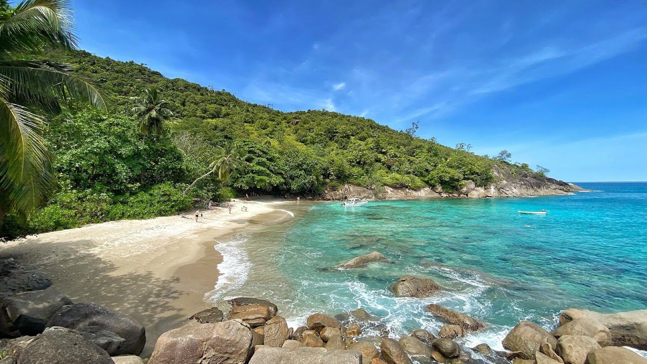 The granite headland and clear water of Anse Major reached by coastal trail on Mahe