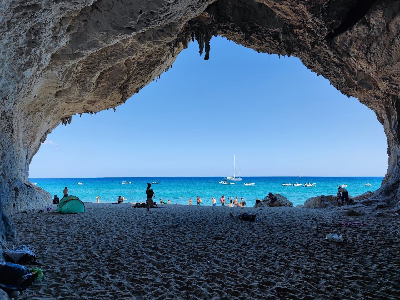 The sea caves and broad clear bay of Cala Luna on the Gulf of Orosei