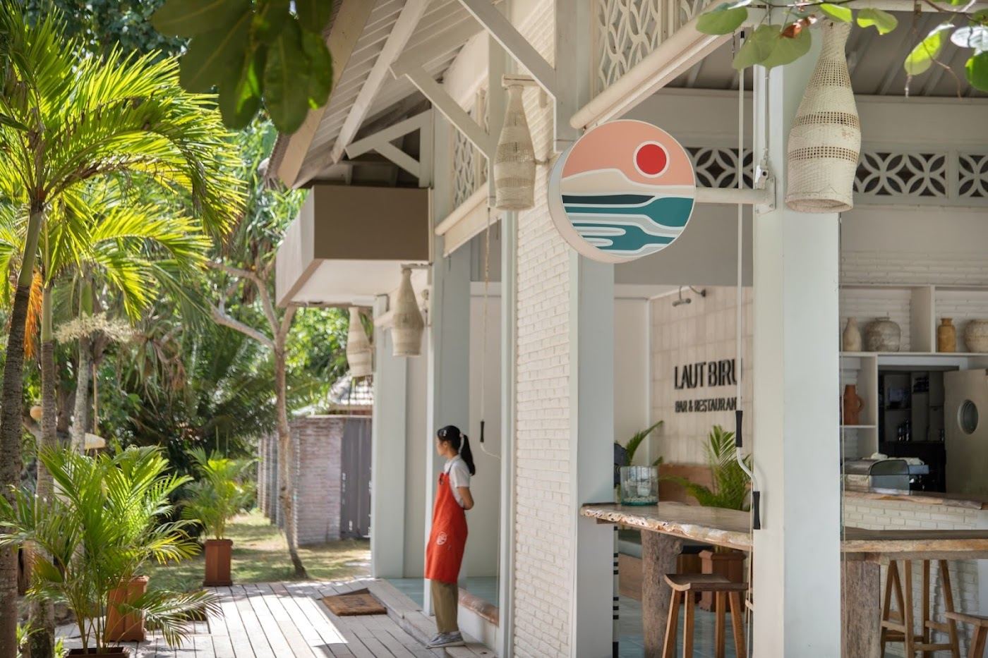 Beachside tables and pale sand at Laut Biru on Selong Belanak in Lombok