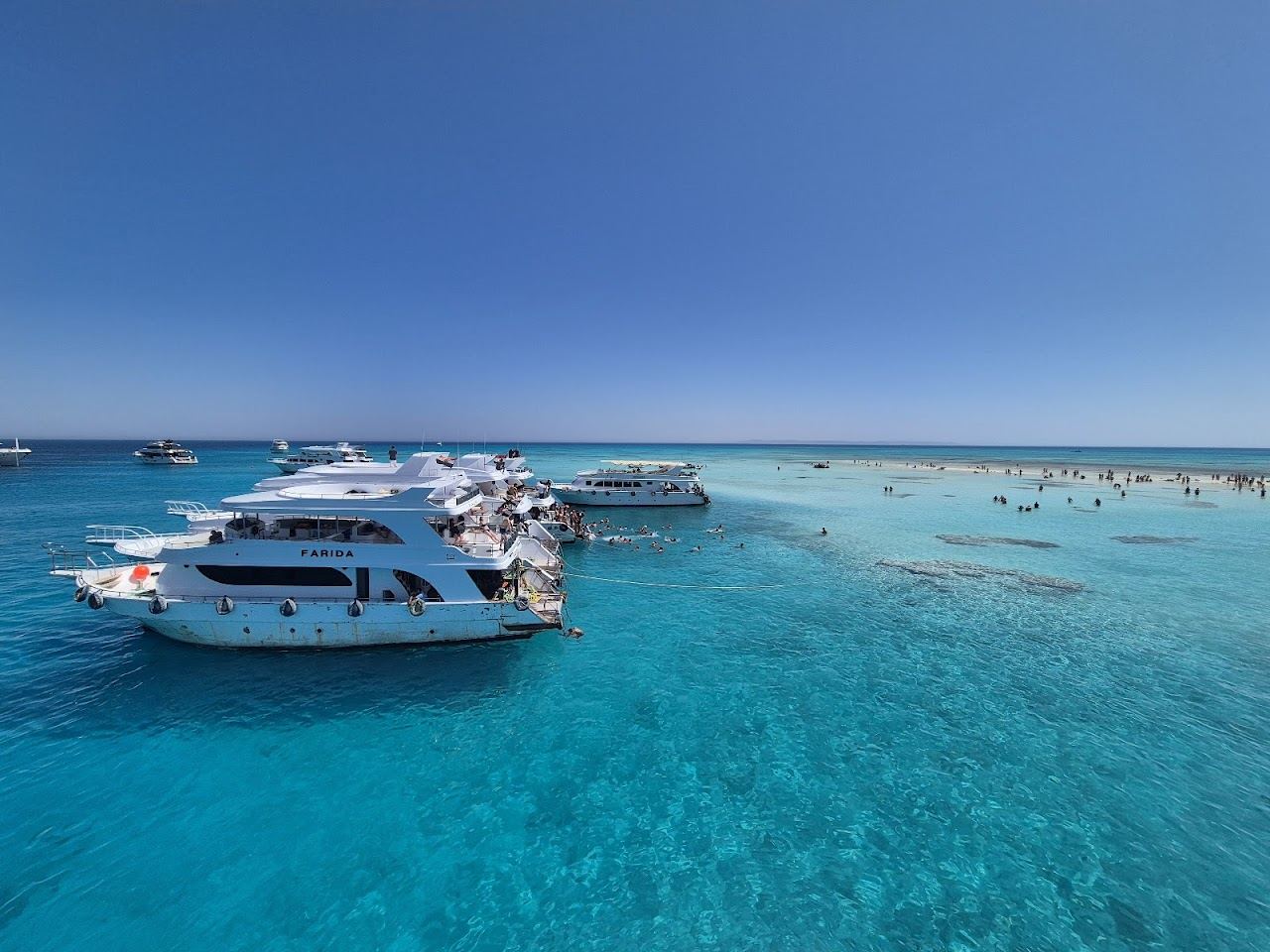 The warm clear Red Sea and sandy shore at Sharm El Sheikh on the Sinai coast of Egypt