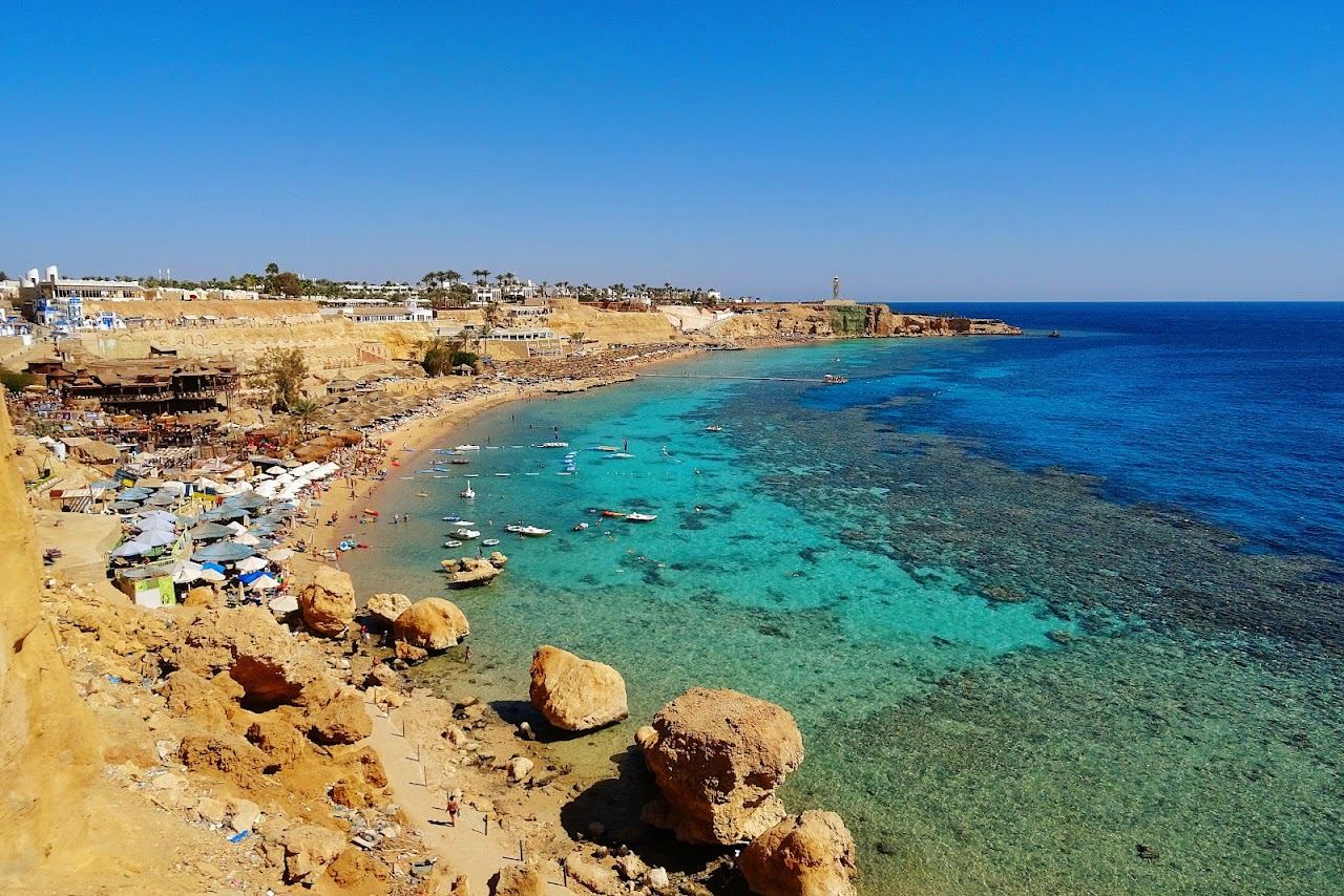The coral reef and clear water below the lighthouse headland at Ras Um Sid in Sharm El Sheikh in Egypt
