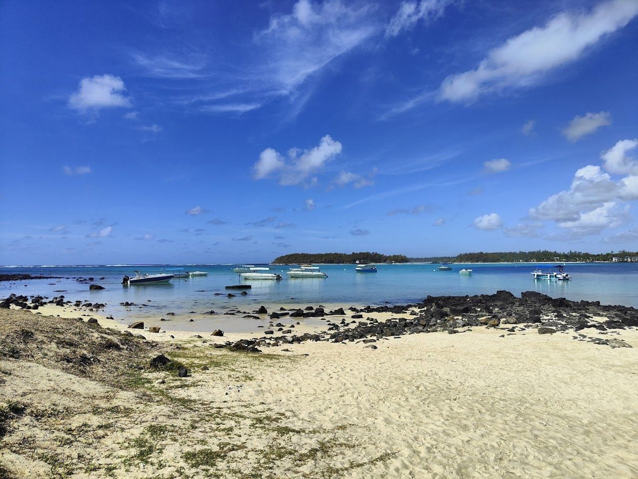 The calm reef sheltered lagoon of Blue Bay on Mauritius with clear shallow water
