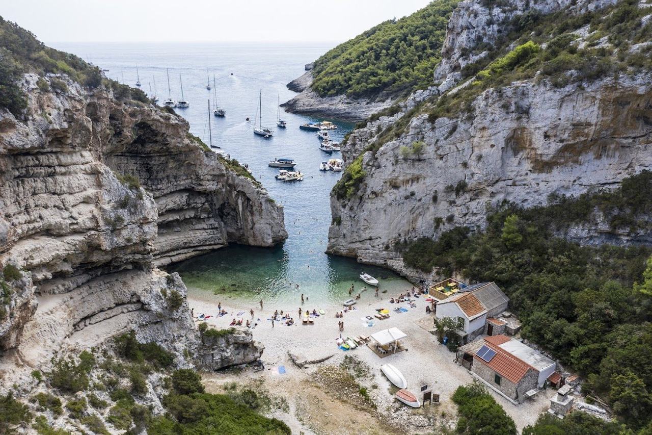 Dramatic cliff framed cove of Stiniva on the island of Vis
