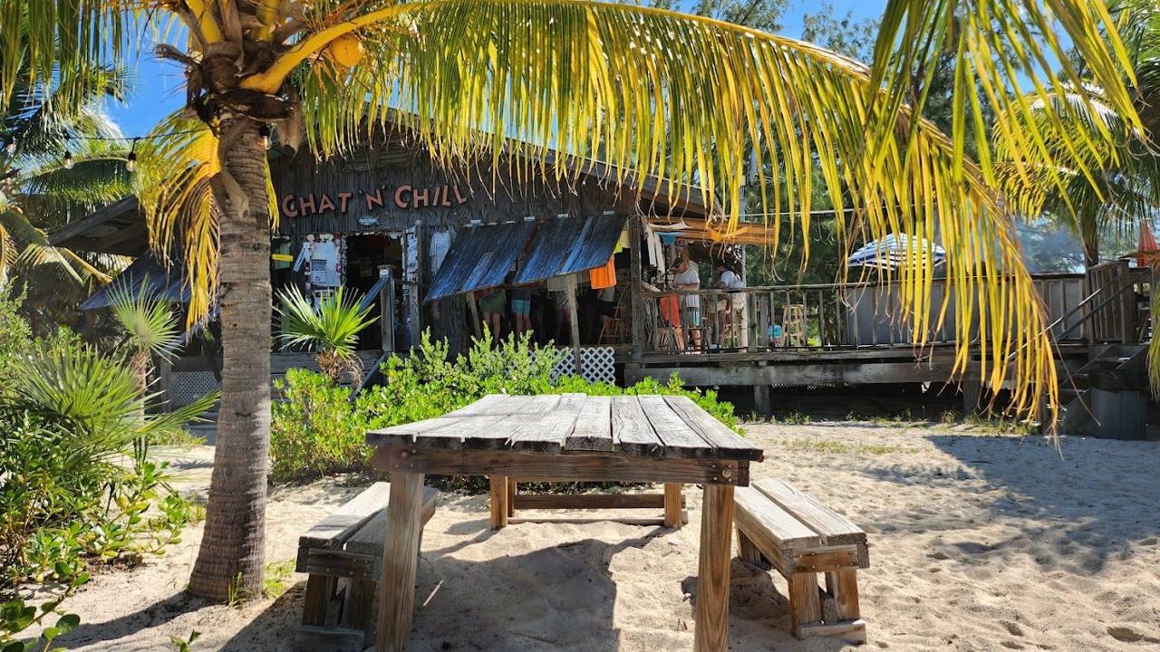 Sheltered beach and clear shallows on Stocking Island in Elizabeth Harbour Great Exuma Bahamas