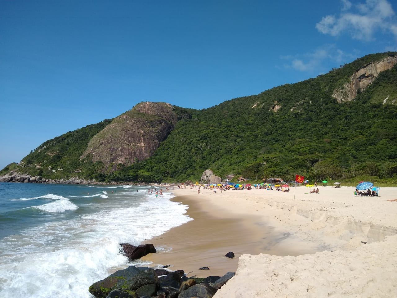 The protected green cove and powerful right wave at Prainha in western Rio