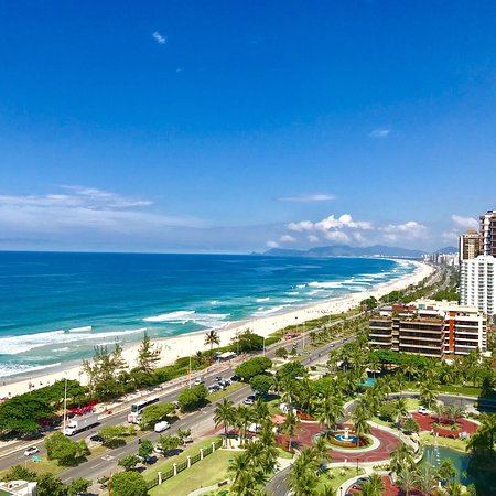 The long open beach break and wide sand at Barra da Tijuca in Rio