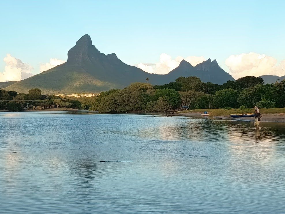 Tamarin beach in Mauritius, a wide bay with surf and a river mouth on the west coast