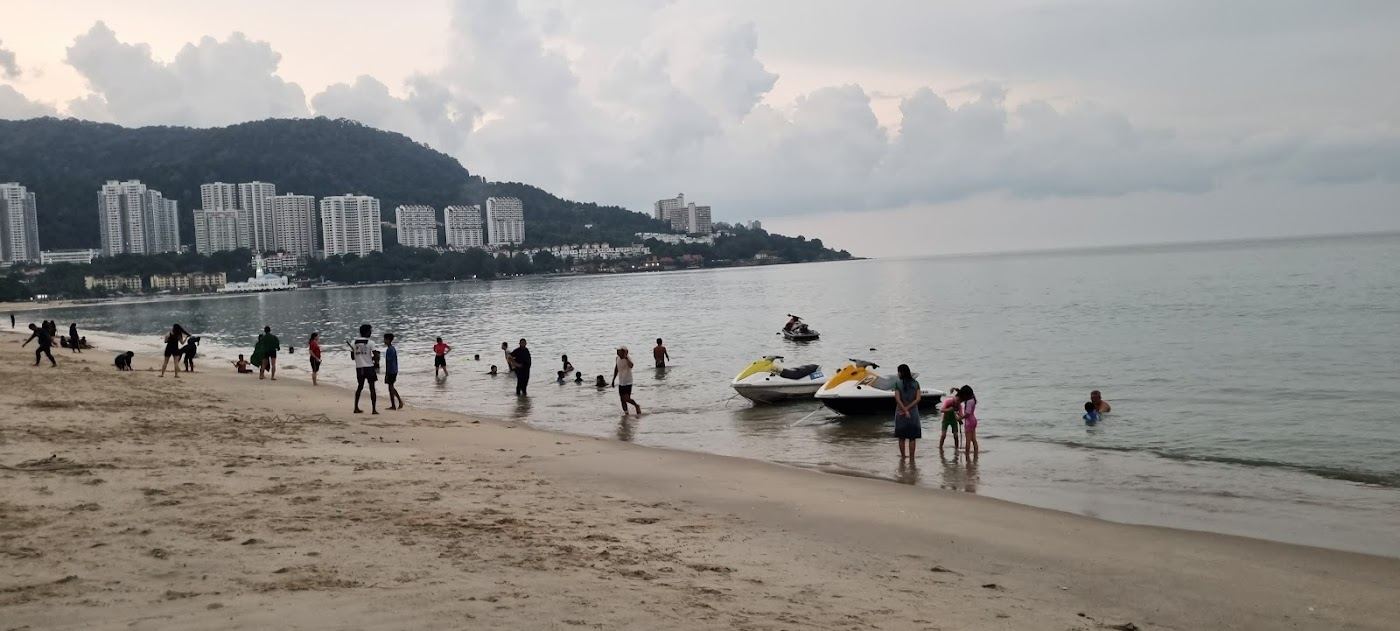 The seafront and promenade at Tanjung Bungah in Penang at dusk