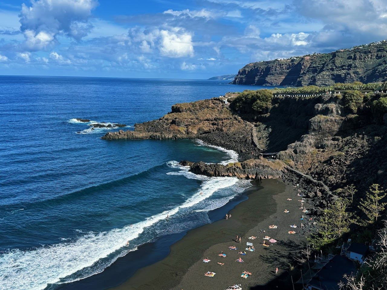The black sand cove of El Bollullo below the cliffs near La Orotava, Tenerife