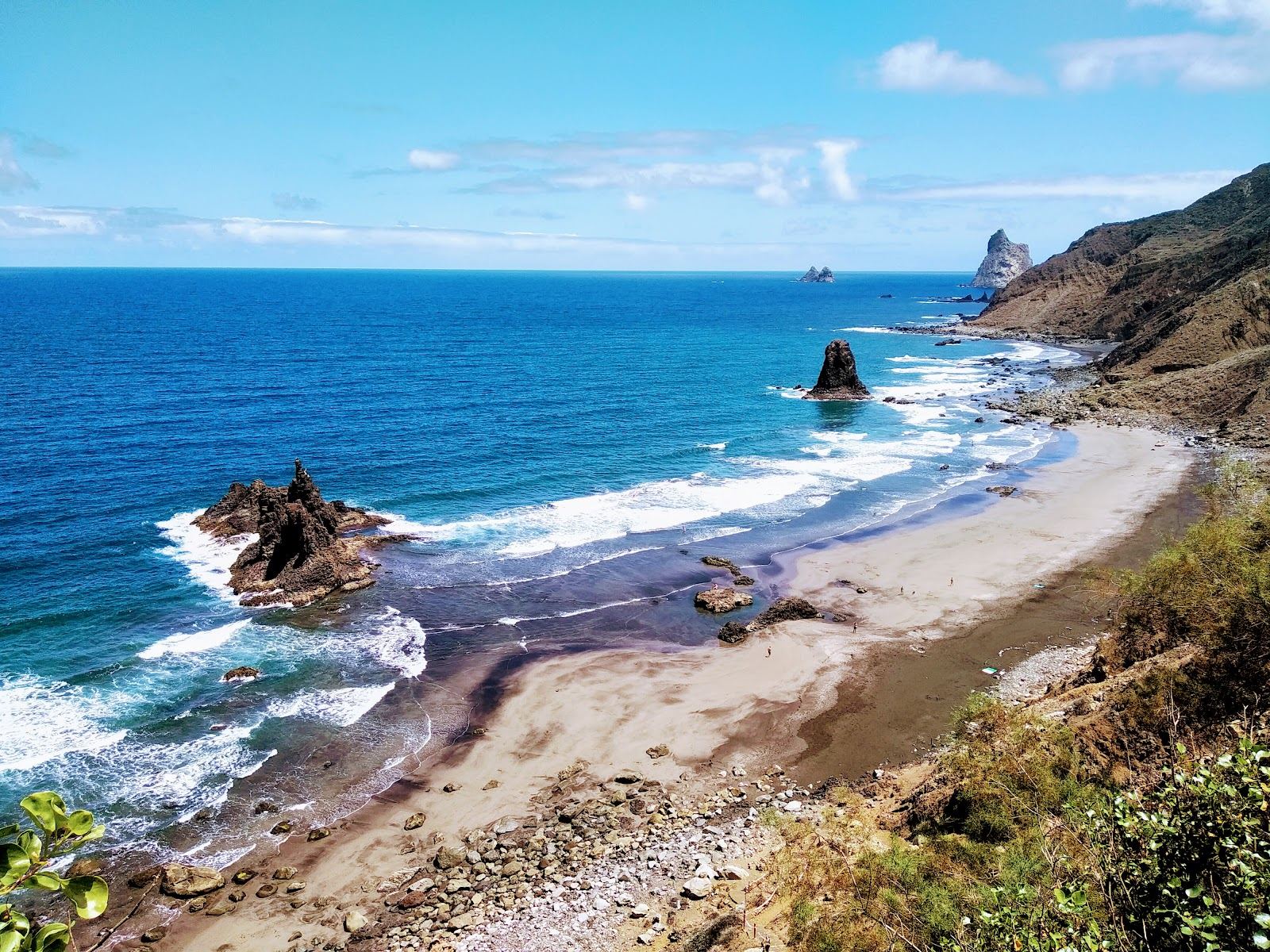Evening light over the black sand and the Roques de Anaga sea stacks at Playa de Benijo in northern Tenerife